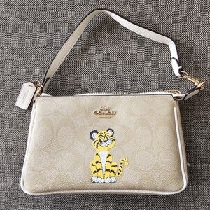 COACH NOLITA 19 IN SIGNATURE CANVAS WITH TIGER